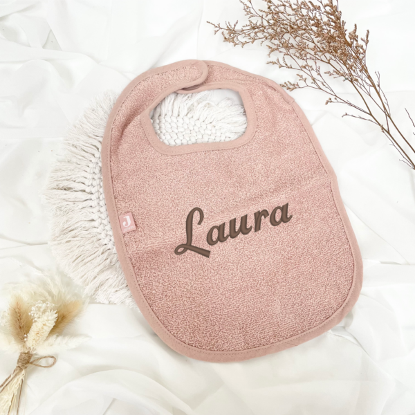 Bavoir brodé rose bébé